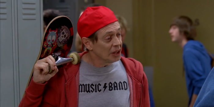 Screen cap of Steve Buscemi wearing a backwards baseball cap in a high school; there is no caption, but it is the famous "how do you do, fellow kids" meme.